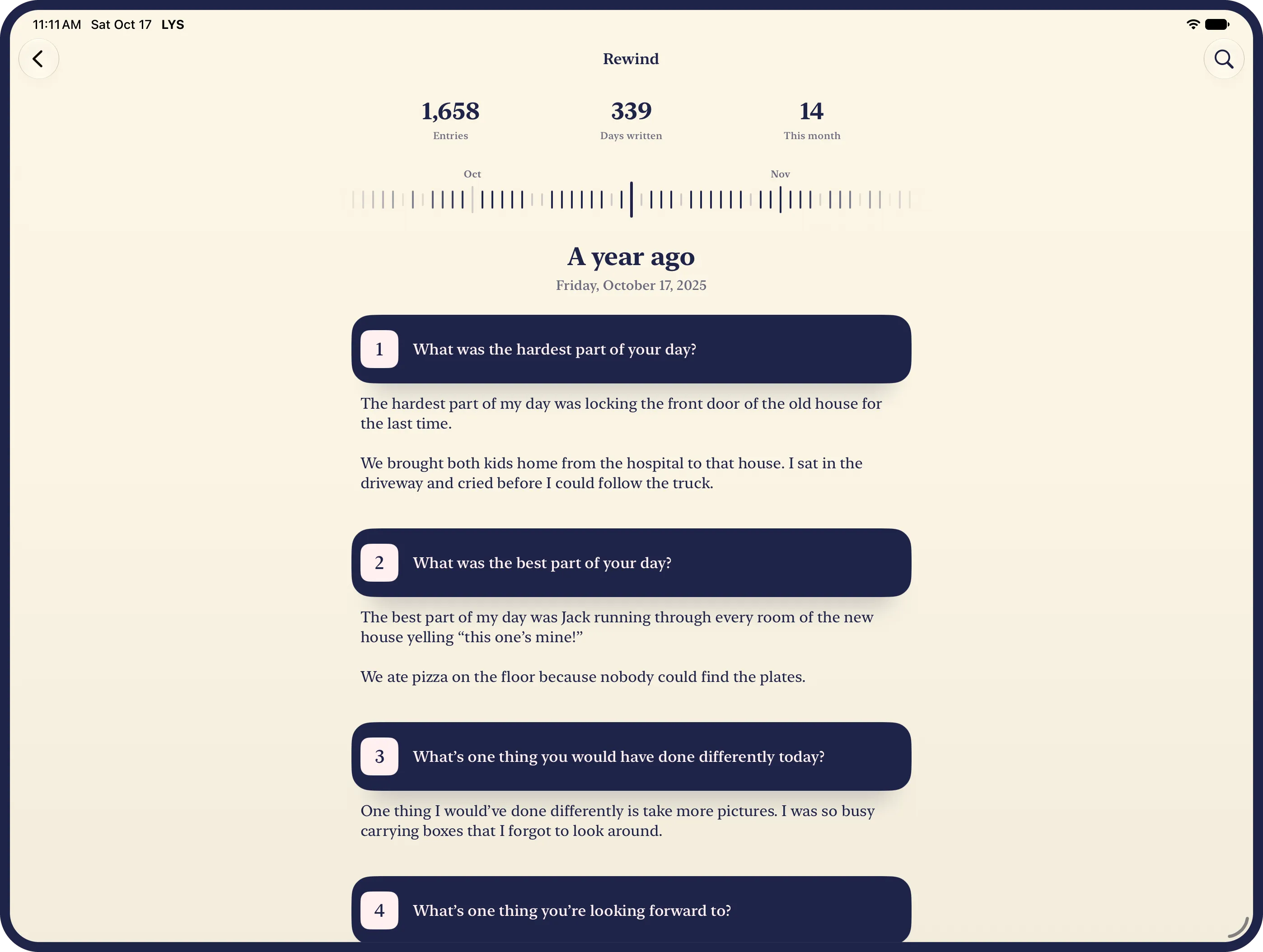 The journal’s Rewind on an iPad: a year ago today, Friday, October 17, 2025, written out, each answered question on its own numbered ink strip with its answer under it, under the wheel of days and the counts of entries, days written and this month.